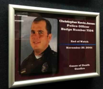  A photo of Officer Kevin Jamesis displayed in the offices of the Dallas Police Association.