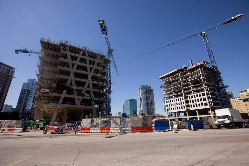 Construction continues on the 23Springs tower and the 2811 Maple apartment high-rise  at the...