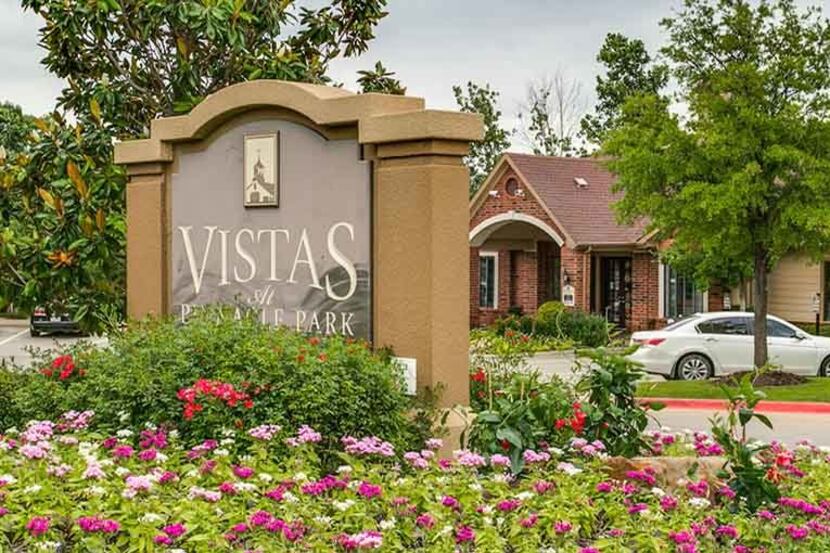 The Vistas at Pinnacle Park in West Dallas were part of the sale.