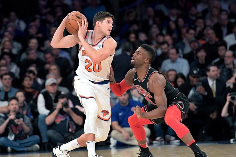 FILE - In this Jan. 10, 2018, file photo, New York Knicks forward Doug McDermott (20)...