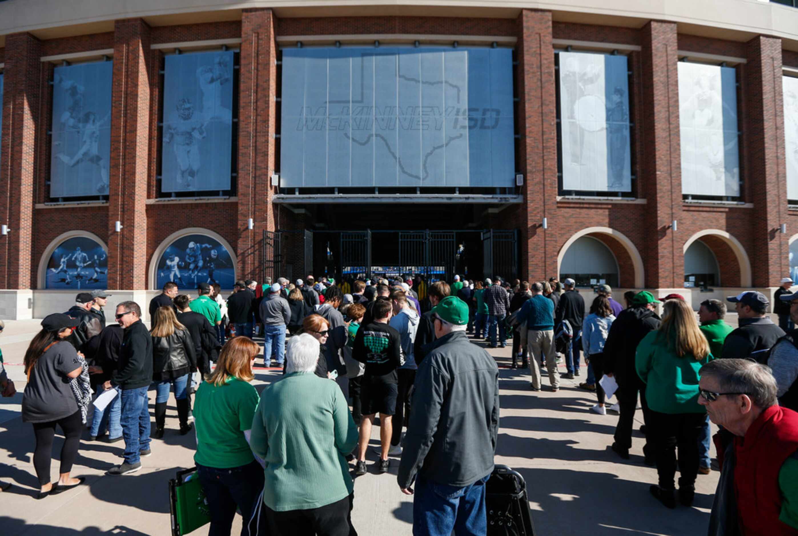 Southlake Carroll fans line up to enter the stadium prior to  a Class 6A Division I Region I...