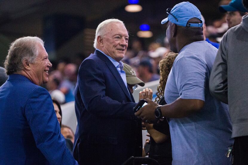 Dallas Cowboys owner Jerry Jones greets fans during a Dallas Cowboys training camp practice...