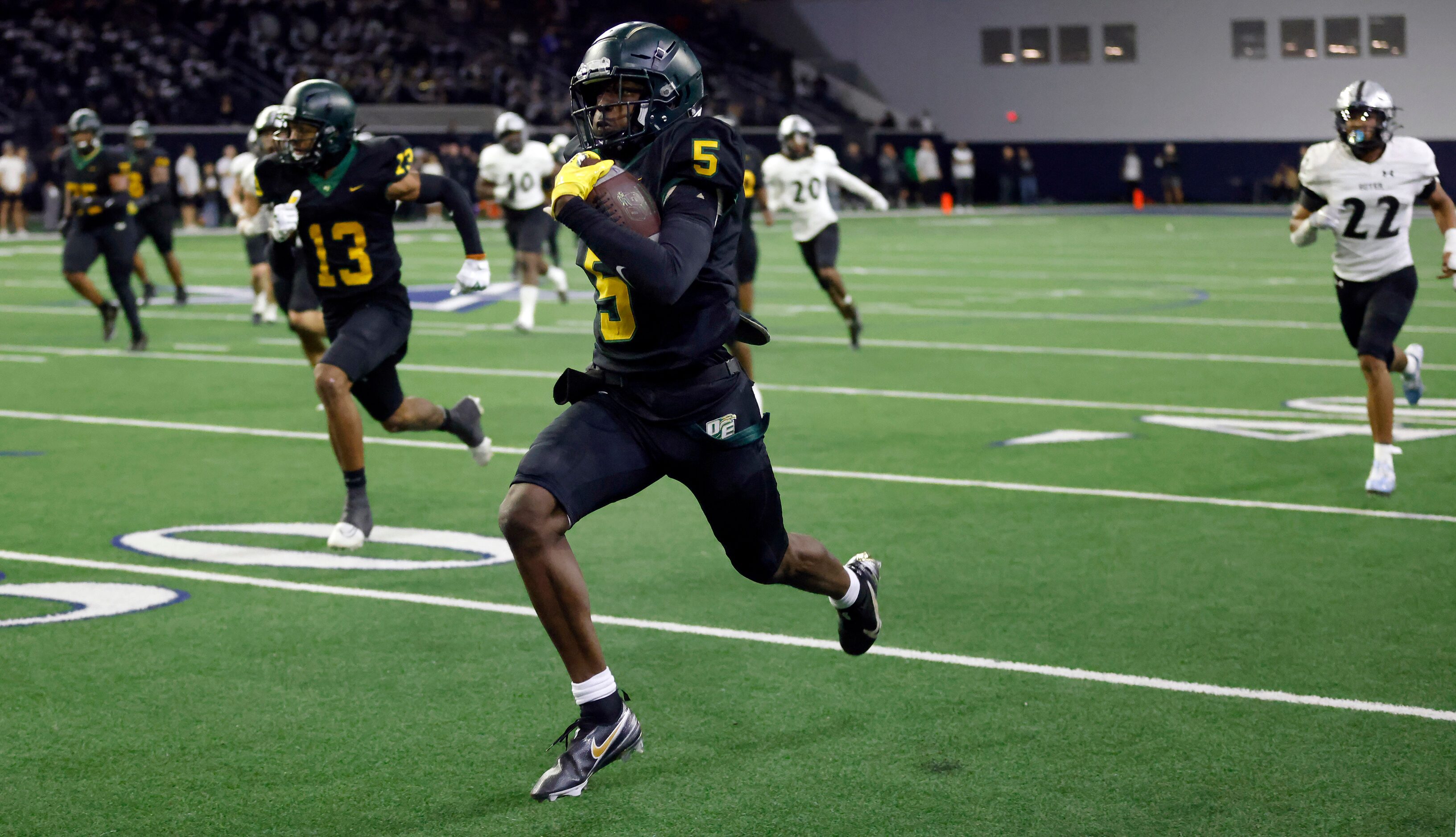 DeSoto running back Tre Wisner (5) races down the sideline on a big fourth quarter run...