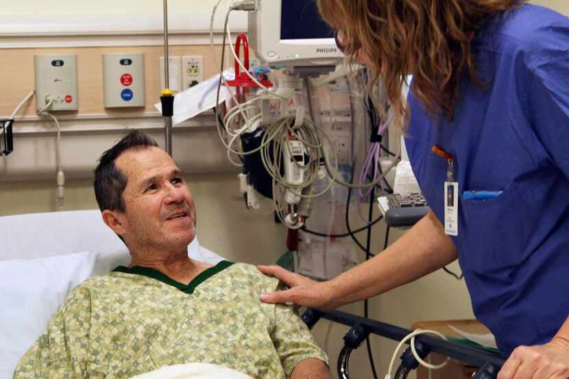 
A nurse prepares liver cancer patient Crispin Lopez Serrano for an endoscopy at a...