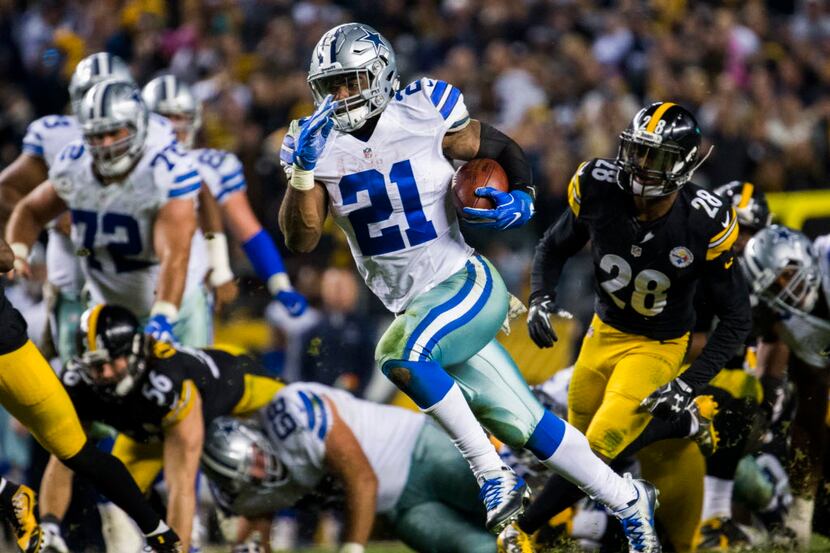 Dallas Cowboys running back Ezekiel Elliott (21) runs the ball to the end zone for the game...