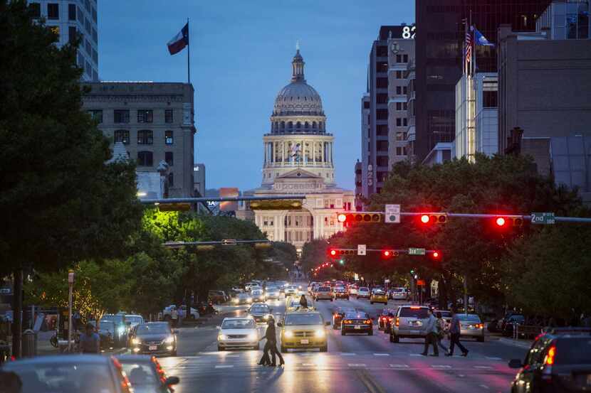  The Texas State Capitol building pictured at dusk on Saturday, April 4, 2015. (Matthew...