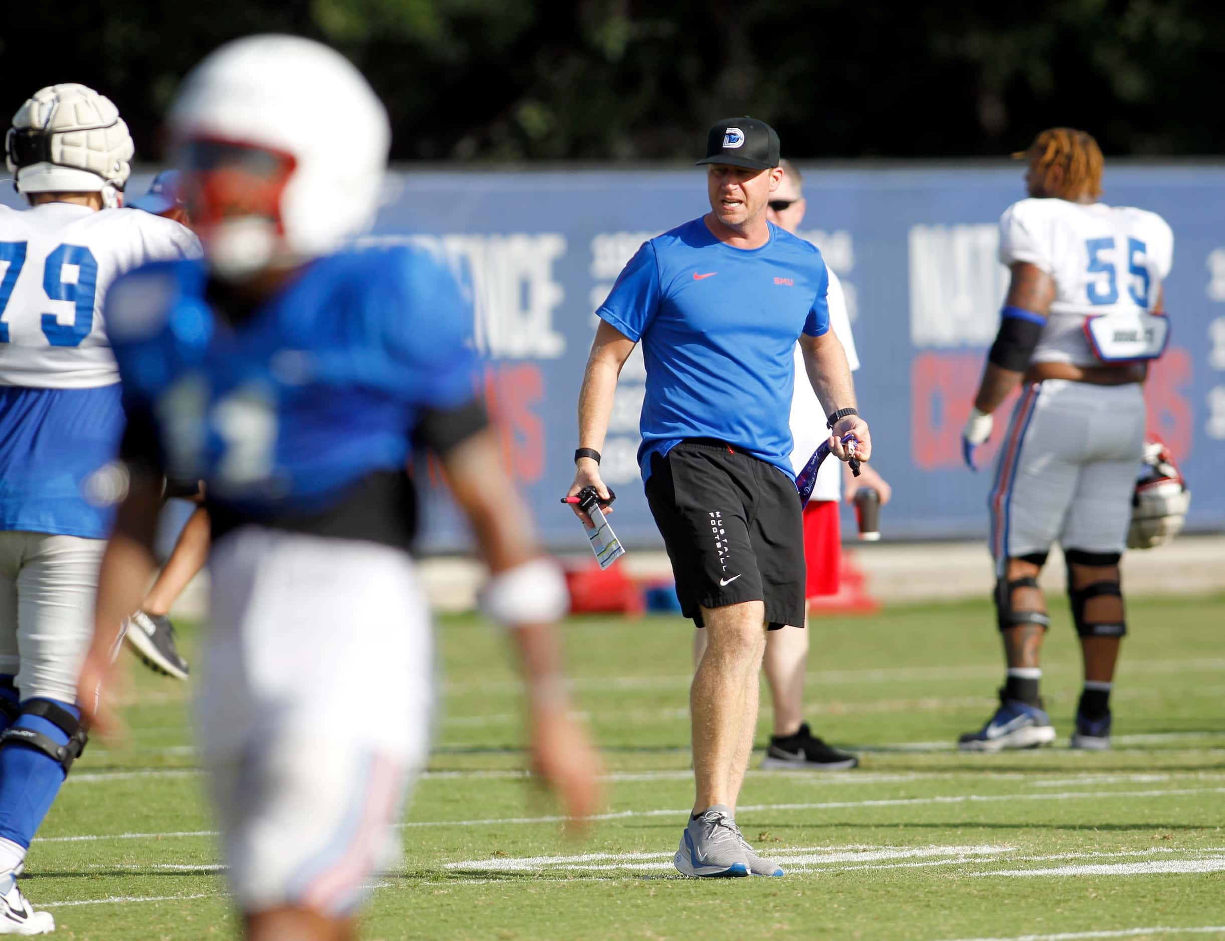 SMU Mustangs head football coach Rhett Lashlee oversees his players through a series of...