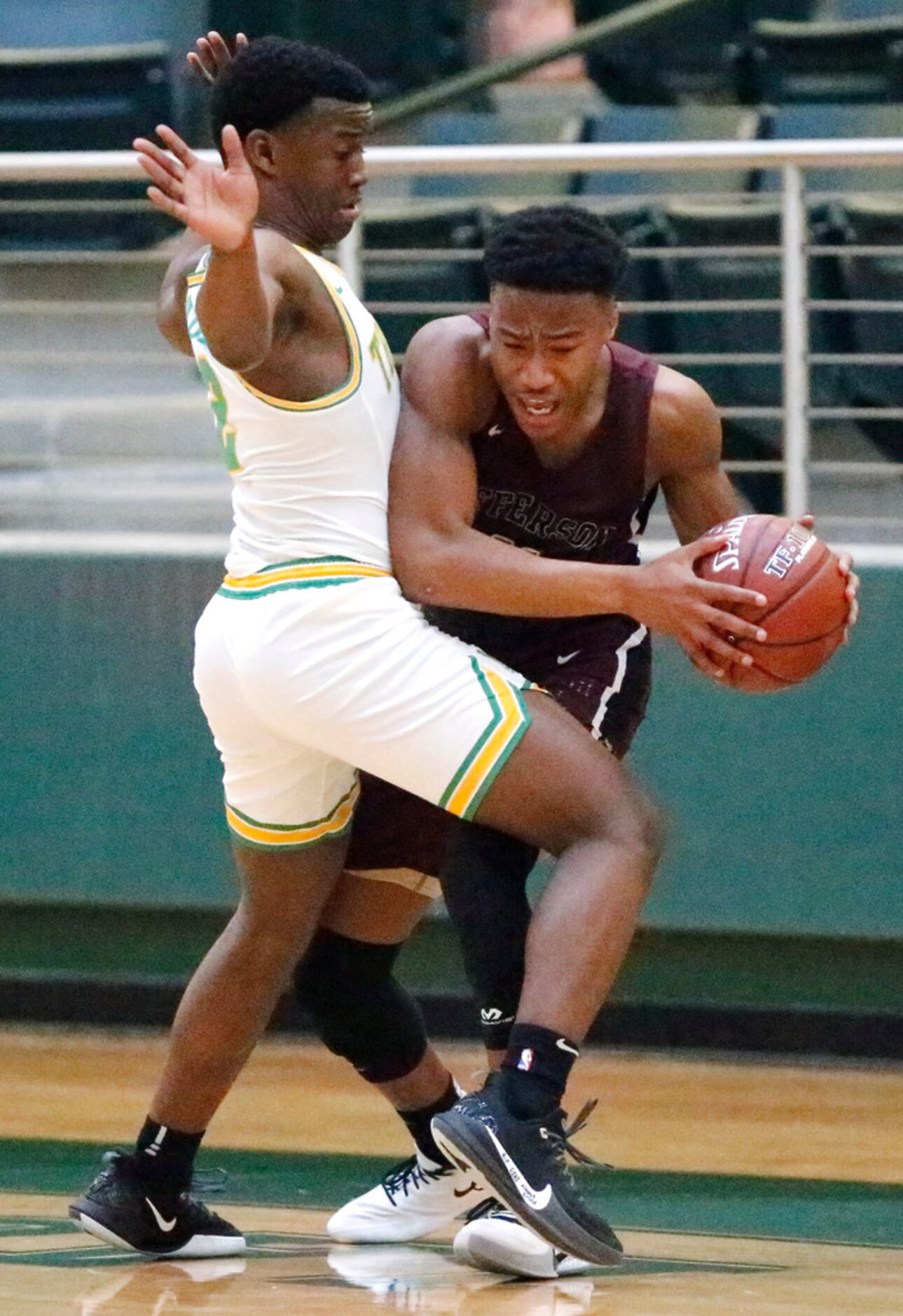 Madison High School guard Kaden Keal (2) presses Jefferson High School guard Josh Thomas...