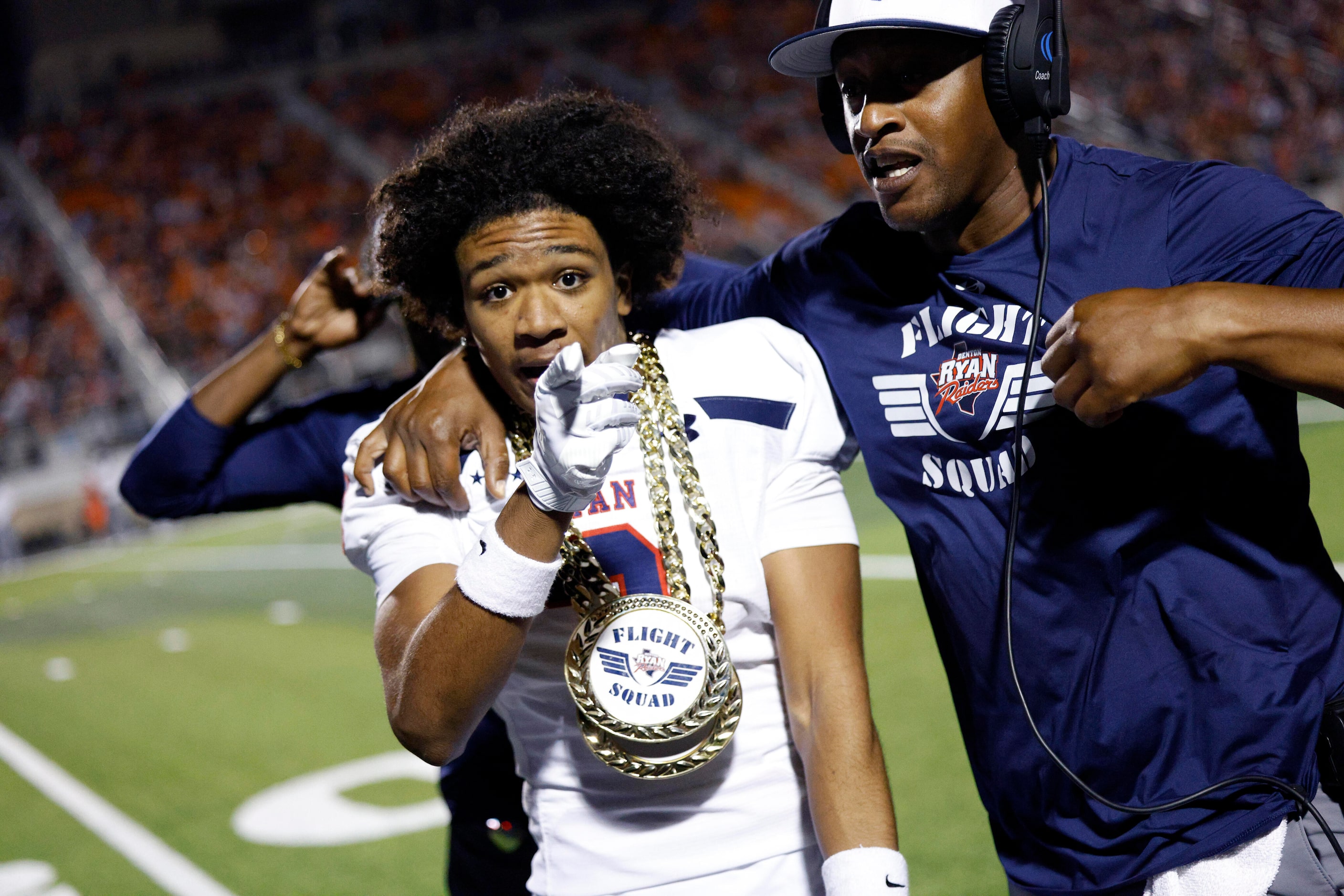 Denton Ryan wide receiver Lorenzo Hill (3) celebrates after scoring a touchdown on a 58-yard...