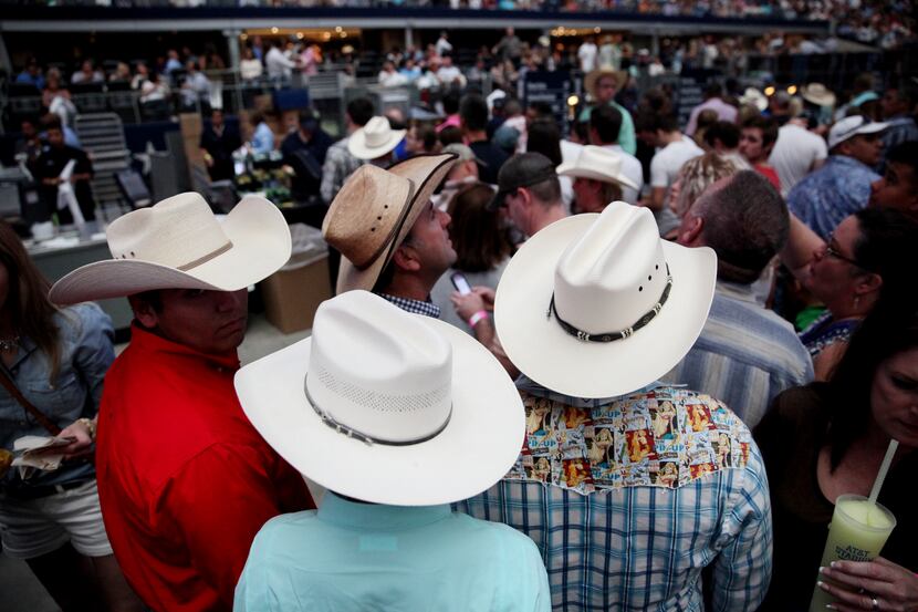 George Strait fans find their seats before Strait plays the last show of his final tour at...