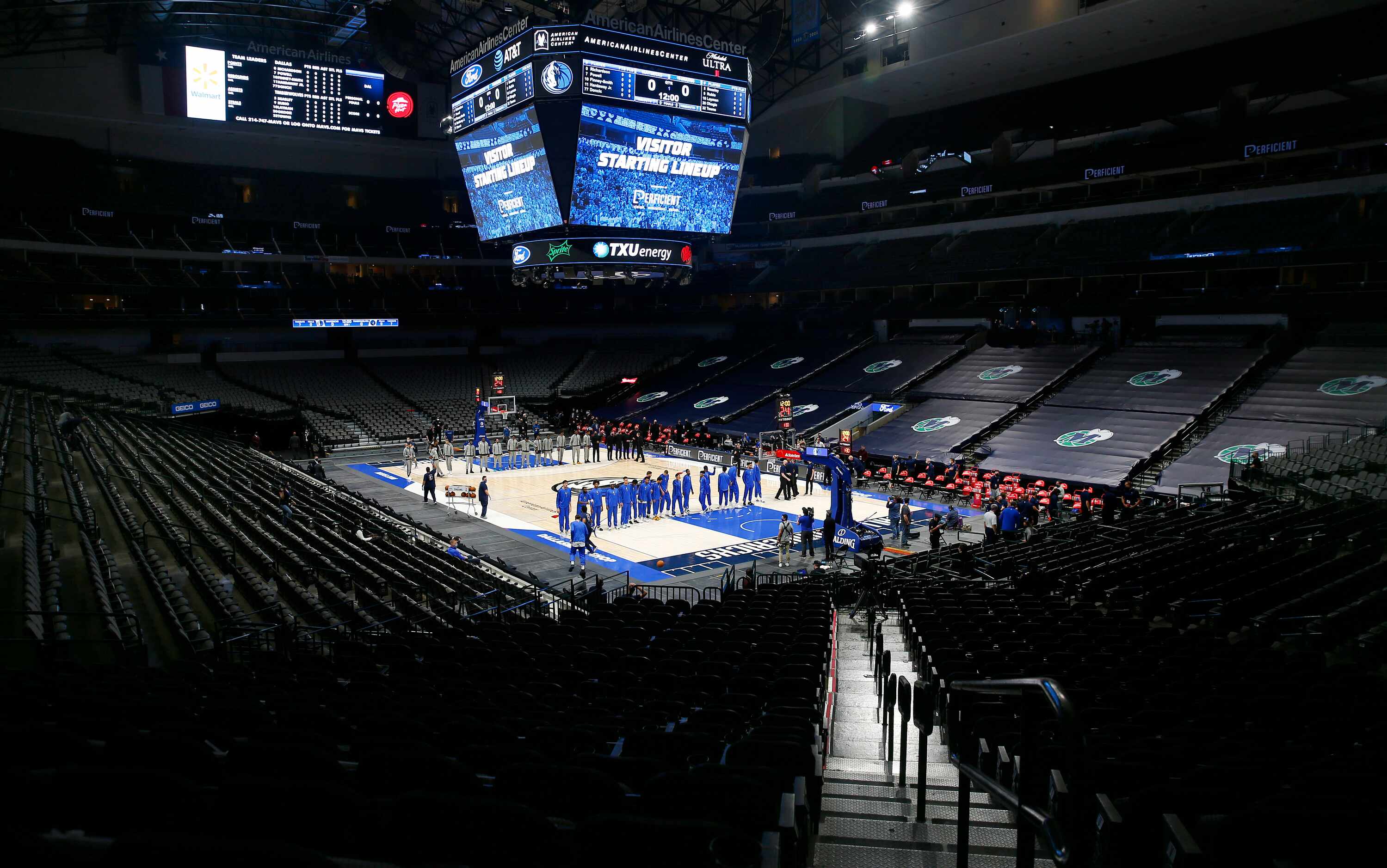 Before the empty stands of the American Airlines Center, the Dallas Mavericks and Minnesota...