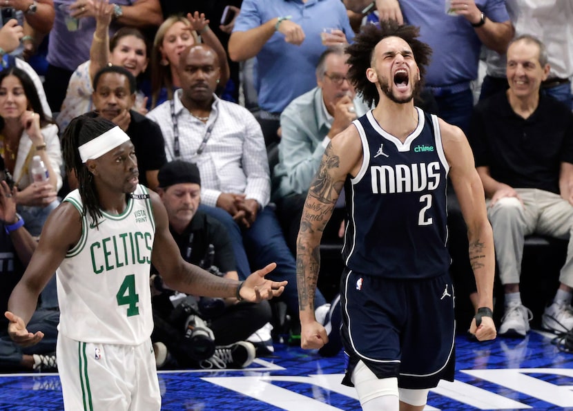 Dallas Mavericks center Dereck Lively II (2) reacts after throwing down a third quarter dunk...