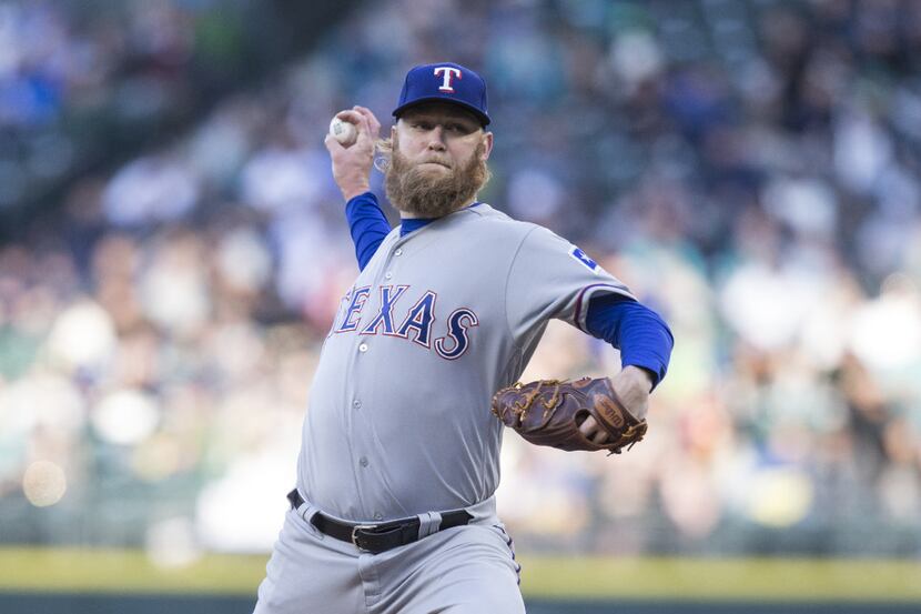 SEATTLE, WA - APRIL 15: Starter Andrew Cashner #54 of the Texas Rangers delivers a pitch...