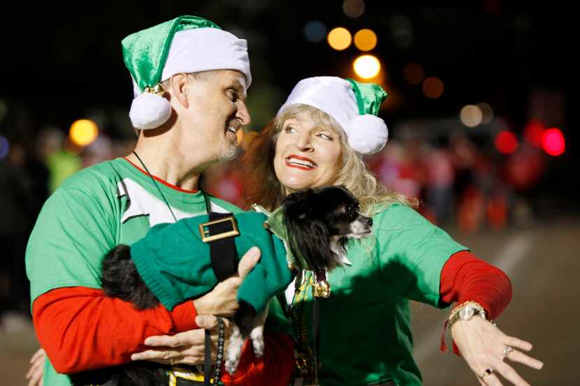 Dan and Karen Ambler danced with their Bendito at last year's Jingle Bell Run, (Ben...