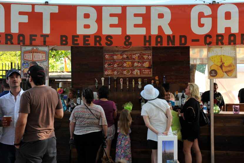 The craft beer garden features 12 local beers on tap at Cottonwood Arts Festival in...