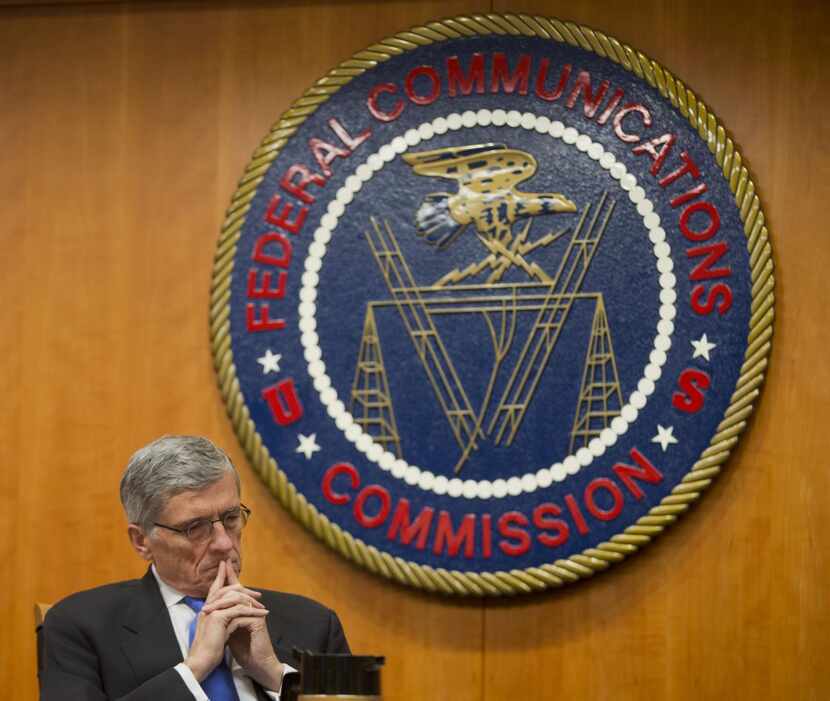 In this Thursday, Feb. 26, 2015, file photo, Federal Communications Commission (FCC)...