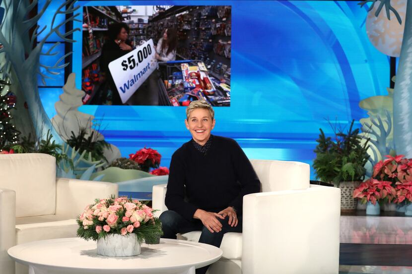 Talk-show host Ellen DeGeneres surprises audience member Nikki Cullors from DeSoto by...