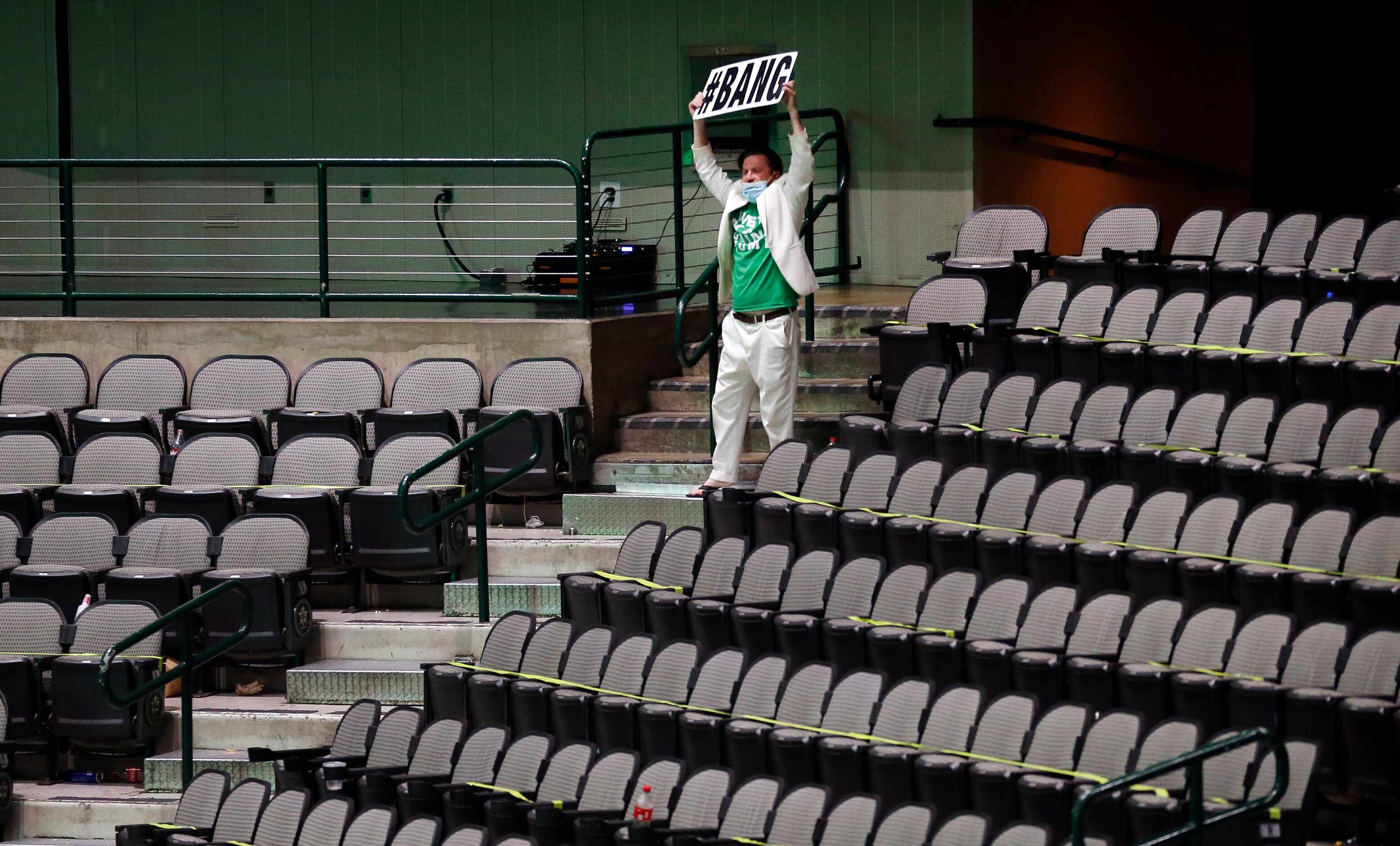 Dallas Stars super fan Nick Moroch stands in an empty American Airlines Center and announces...