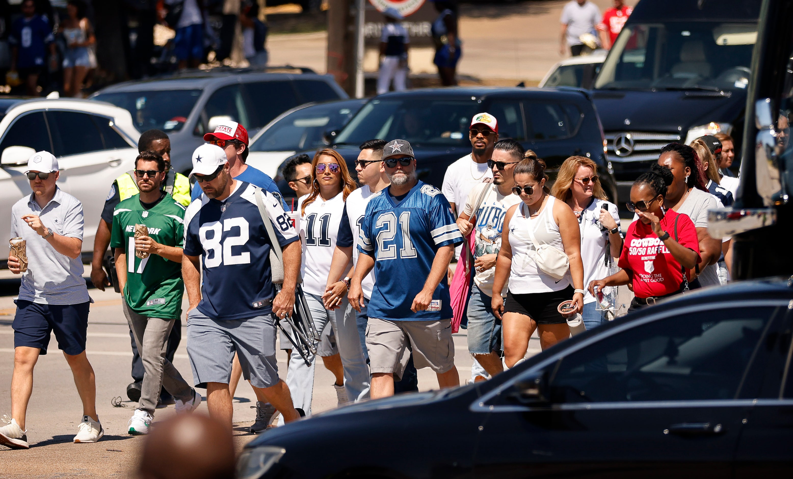 Dallas Cowboys fans arrive for the home opener against the New York Jets at AT&T Stadium in...