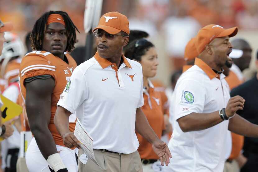 FILE - In this Sept. 26, 2015, file photo, Texas defensive coordinator Vance Bedford watches...