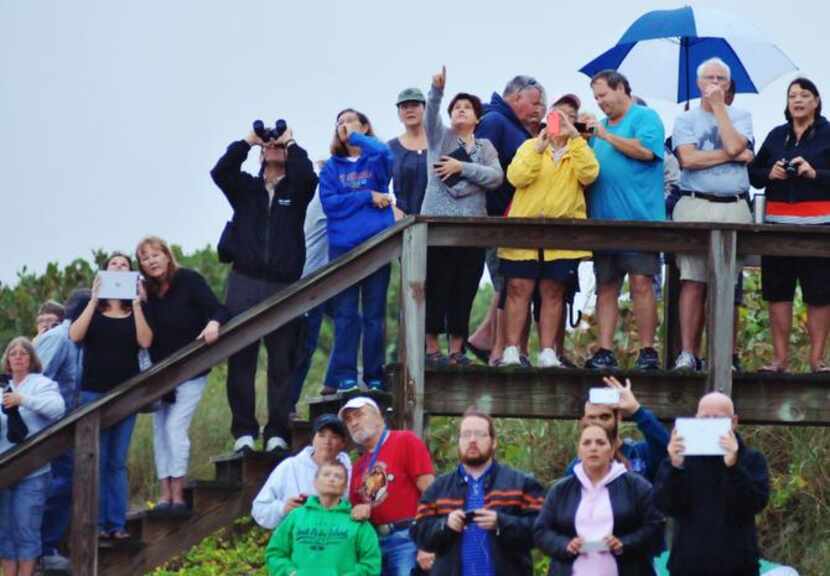 
Spectators gathered to watch the liftoff of NASA’s Orion spacecraft from Cape Canaveral on...