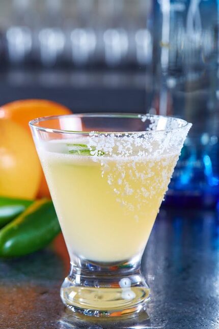 The Bee Sting is a tequila-based cocktail with Cointreau, grapefruit juice, lime, agave and...