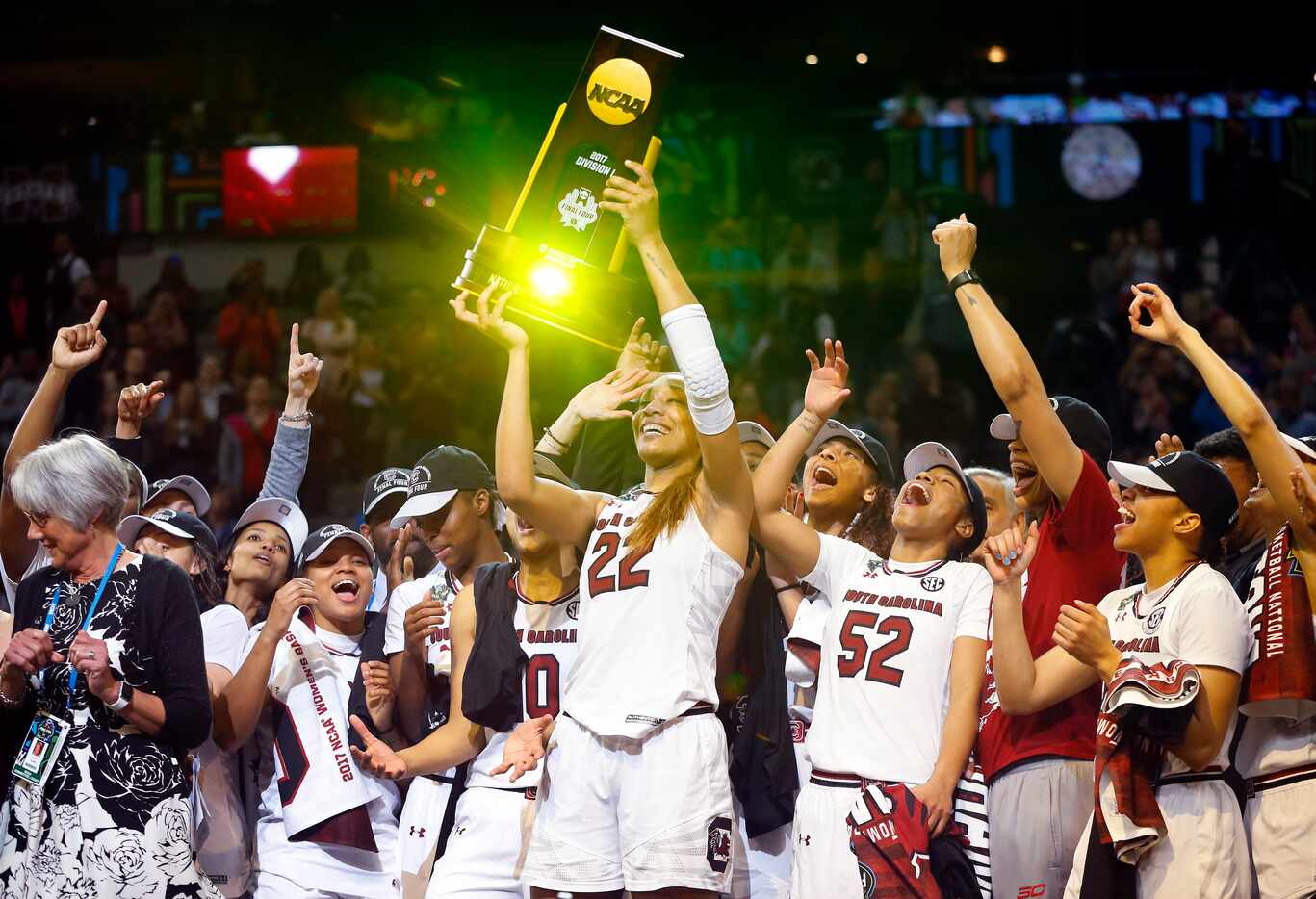 South Carolina Gamecocks forward A'ja Wilson (22) hoisted the winning trophy after defeating...