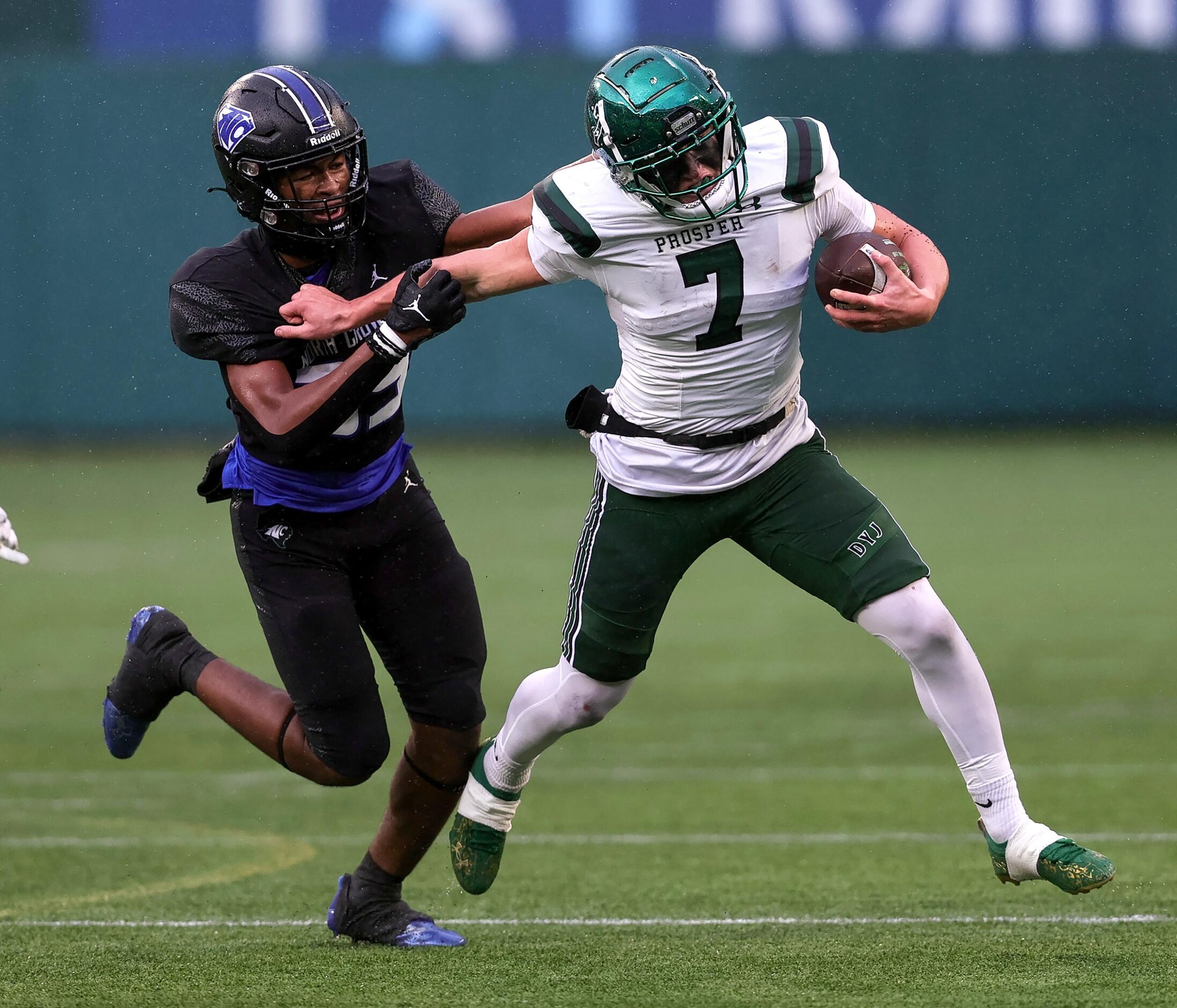 Prosper half back Brayden Rymer (7) tries to break a tackle from North Crowley linebacker...