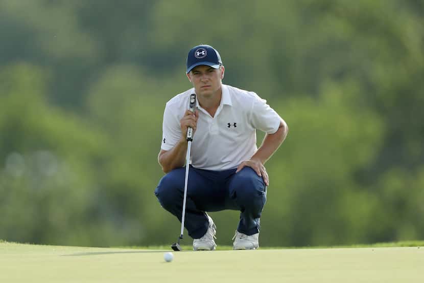 OAKMONT, PA - JUNE 18:  Jordan Spieth of the United States lines up a putt on the third...