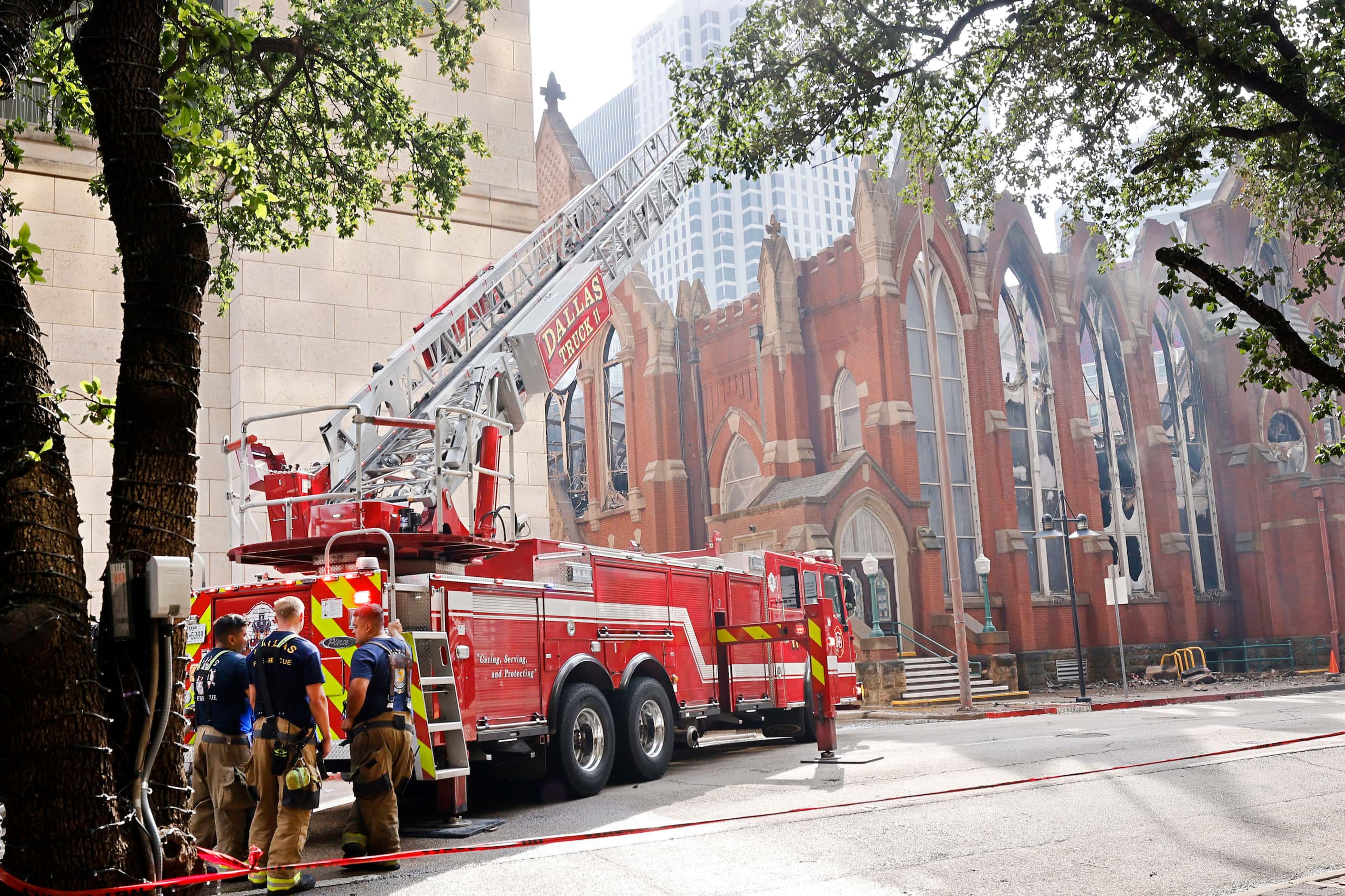 Firefighters are still on the scene of a fire at the historic First Baptist Dallas church,...