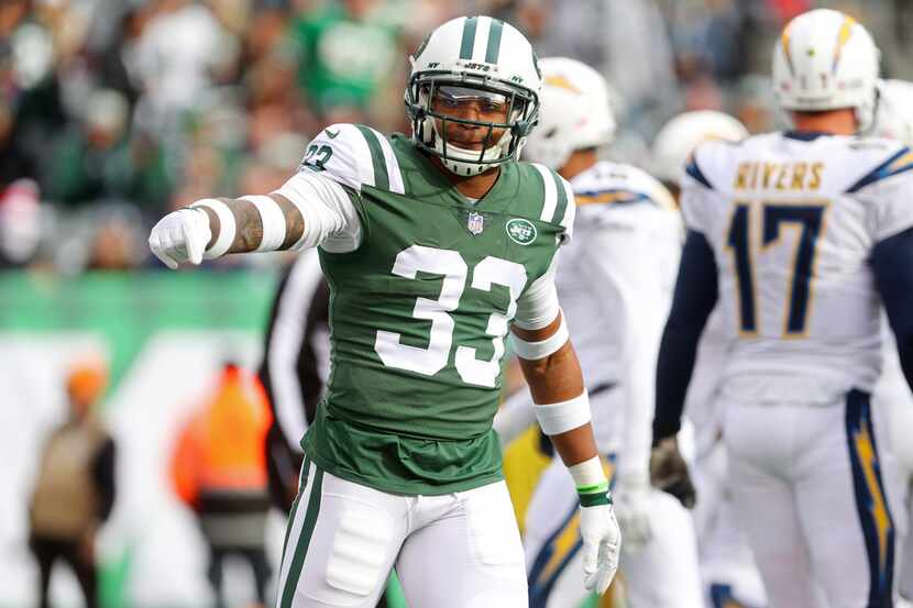 EAST RUTHERFORD, NJ - DECEMBER 24: Jamal Adams #33 of the New York Jets reacts against the...