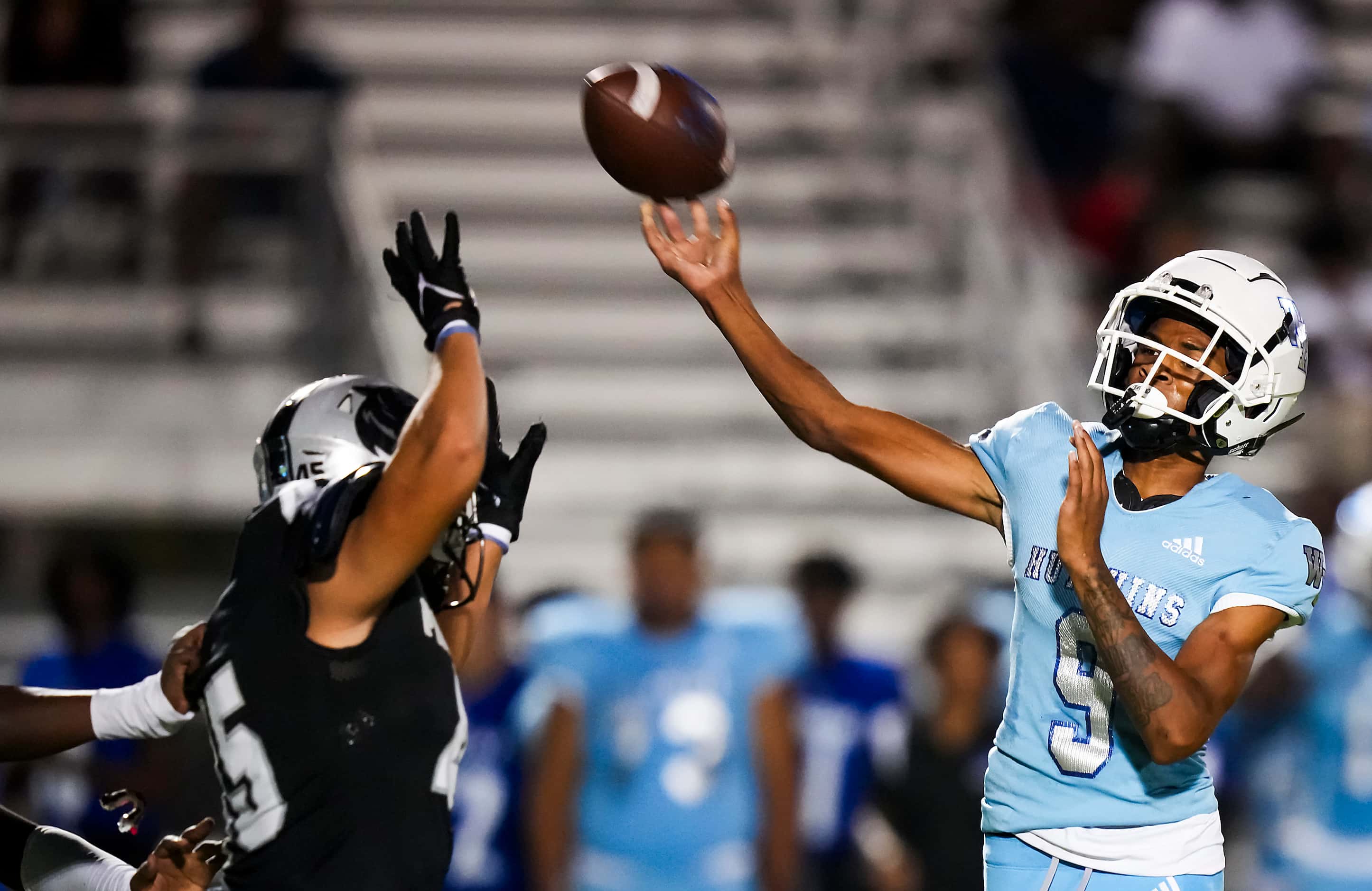 Wilmer-Hutchins quarterback Tamajae Mcmillon (9) throws a pass over Panther Creek’s Seth...
