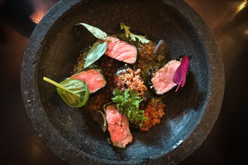 Betel-leaf-wrapped Mishima Reserve Wagyu beef with mint-balm chimichurri, smoked trout roe...