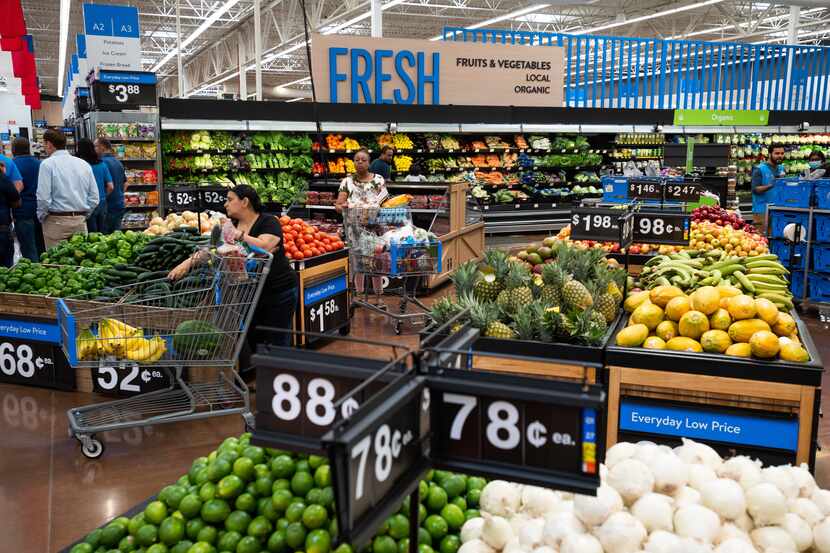 New signs added to the produce section inside a remodeled Walmart store in Forney. It's one...