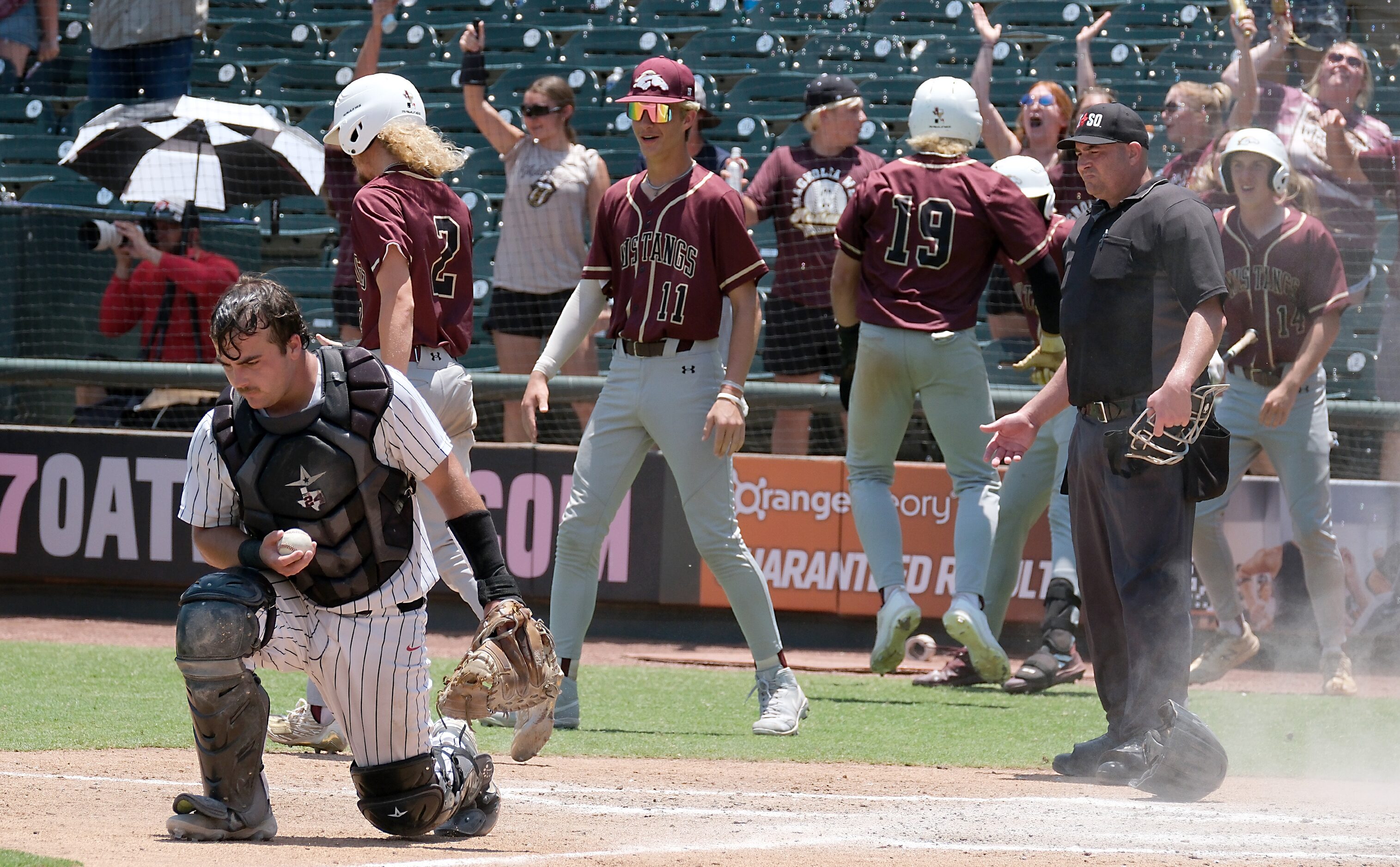 Argyle Hunter Sandifer, (8), gets up from home plate after Magnolia West scored three runs...