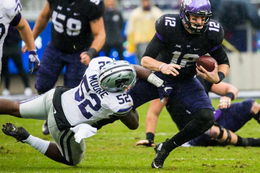 TCU Horned Frogs quarterback Foster Sawyer (12) is tackled by Kansas State Wildcats...