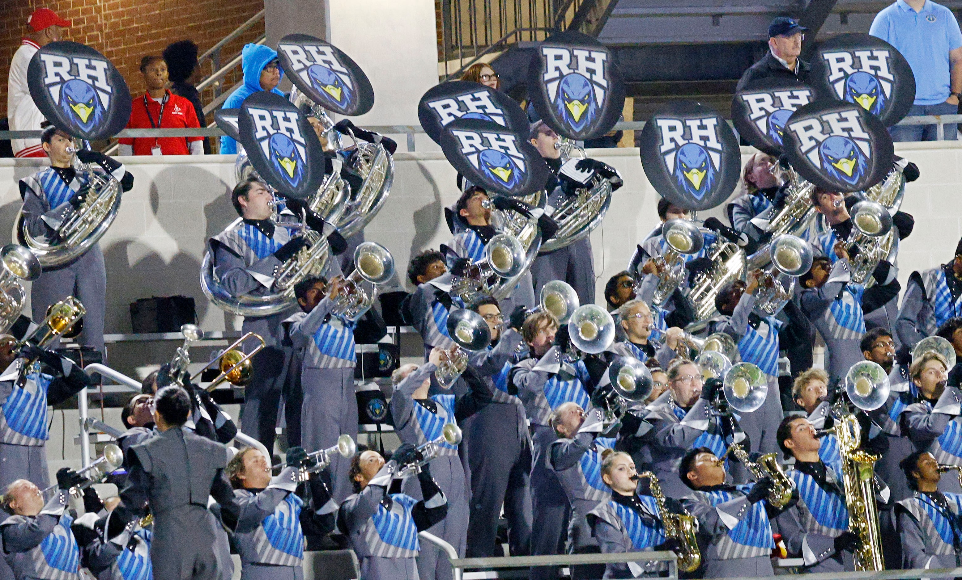 Rock Hill marching band members  perform in the second half of a high school football game...