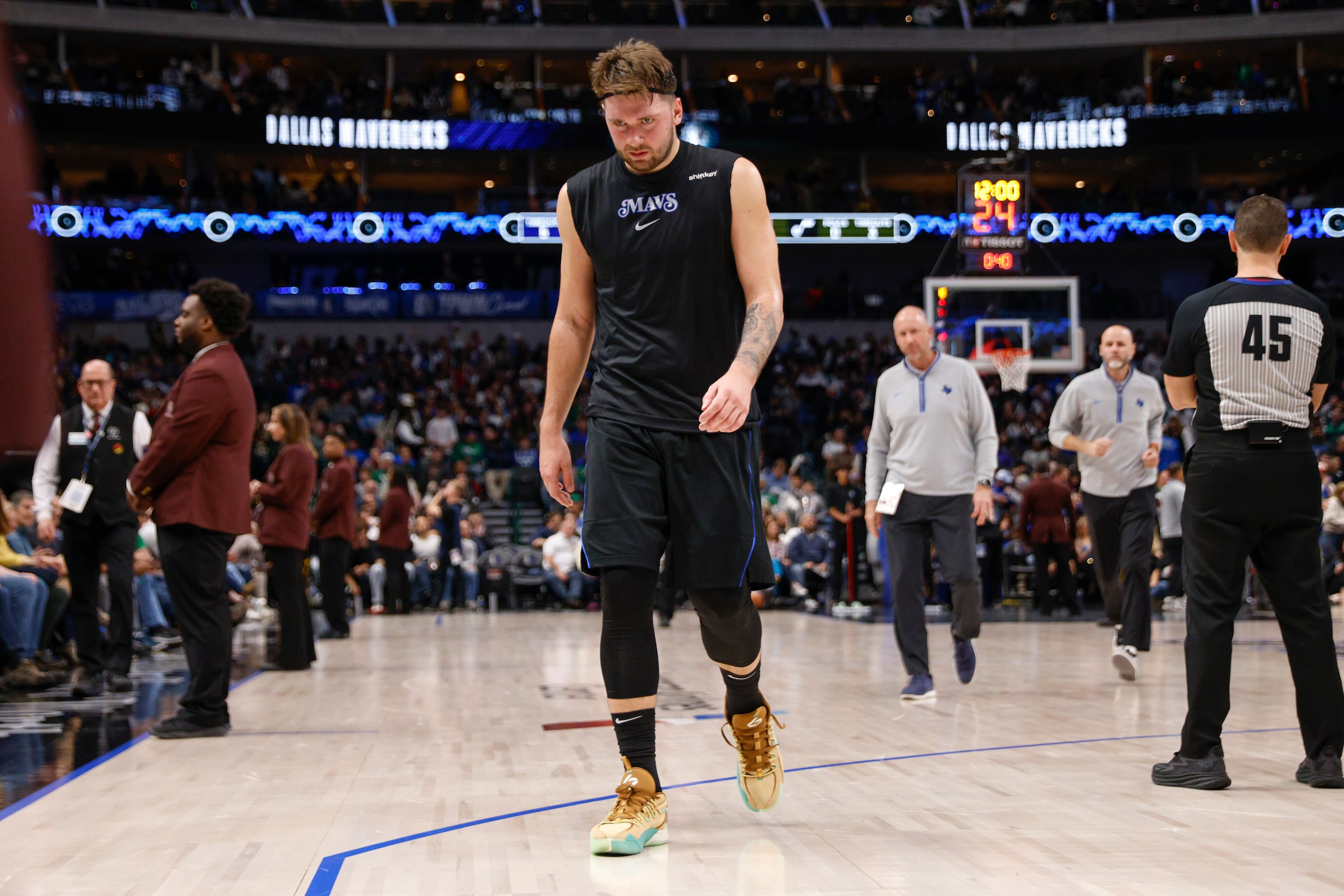 Dallas Mavericks guard Luka Doncic (77) heads to the locker room after the third quarter of...