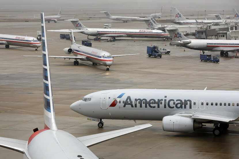 American Airlines jets maneuver around American's terminals at DFW International Airport.