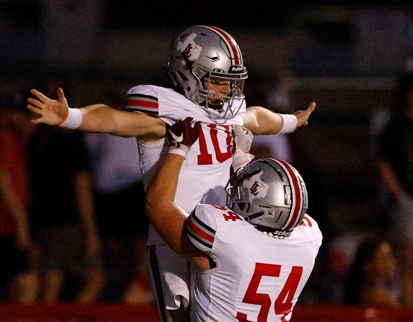 Lovejoy's Alexander Franklin (10) celebrates his touchdown  with his teammate Lovejoy's...