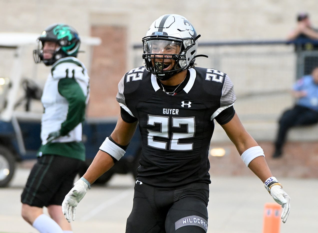 Denton Guyer's Peyton Bowen (22) celebrates after his touchdown in the second half of a...