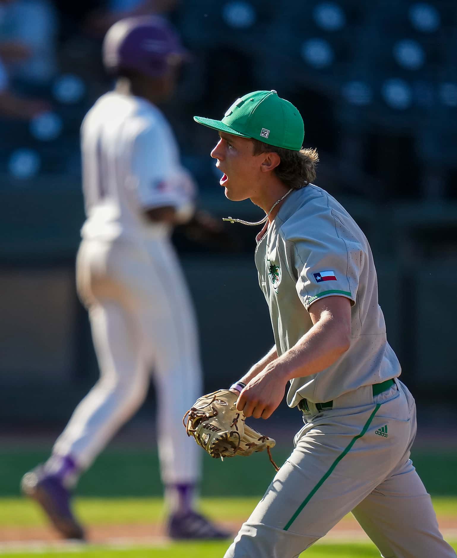 Southlake Carroll pitcher Griffin Herring celebrates after collecting a strikeout to end the...