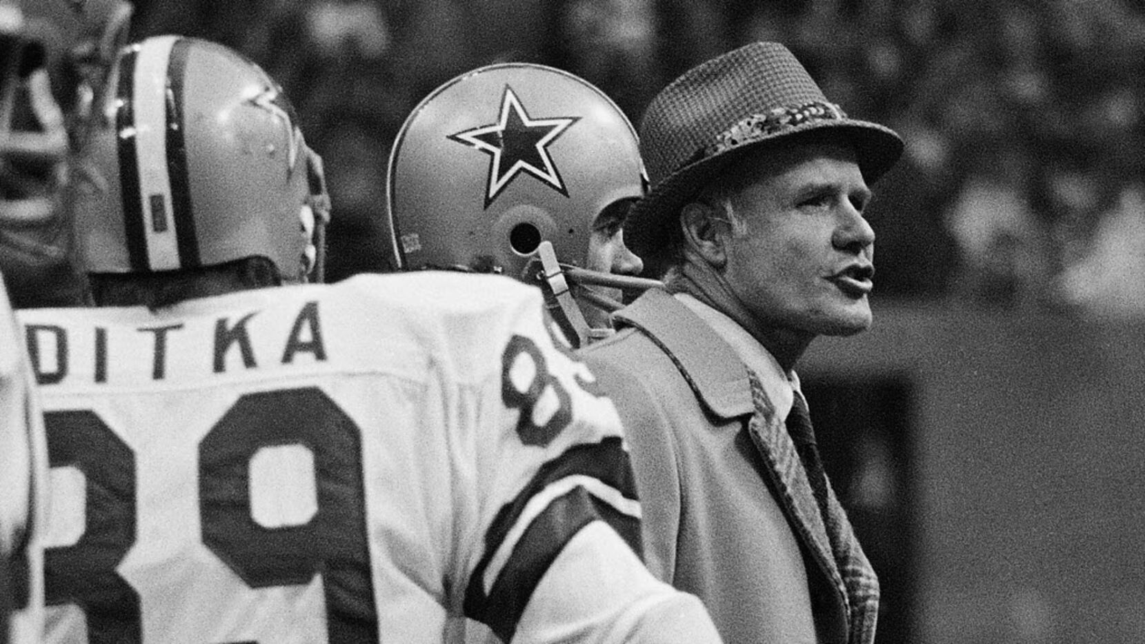 Dallas Cowboys head coach Tom Landry directs his players through a