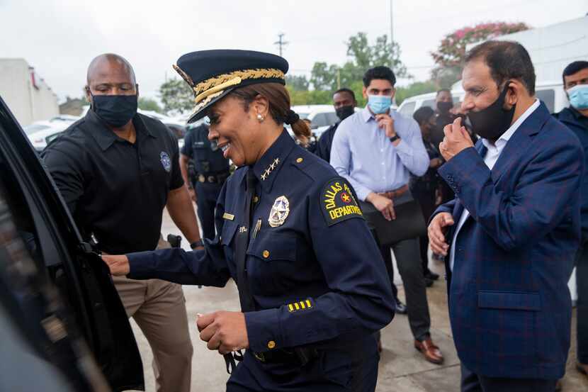 Dallas Police Chief U. Reneé Hall gets in her car following a press conference about the...
