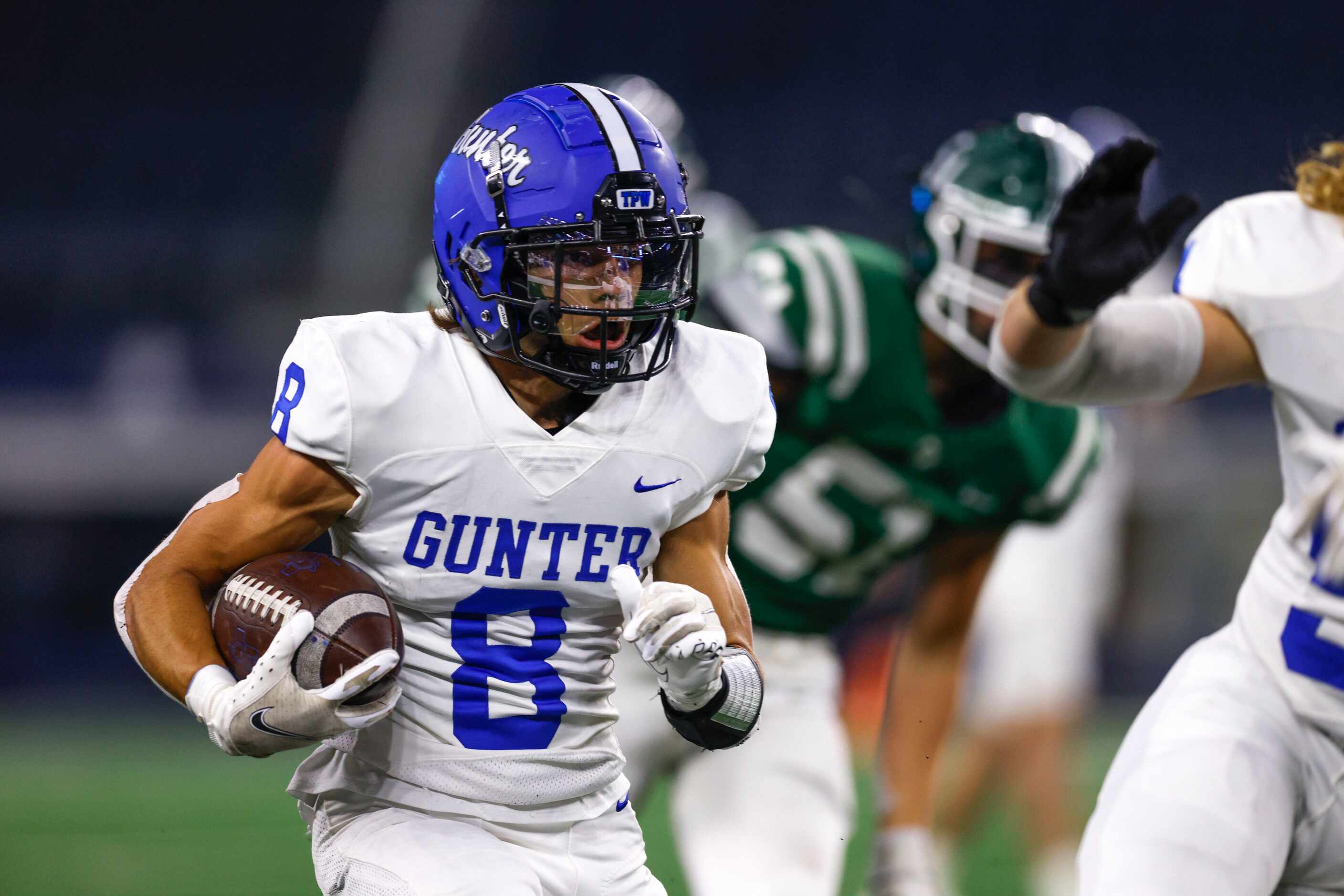 Gunter running back Ethan Sloan (8) runs the ball during the first quarter of their Class 3A...