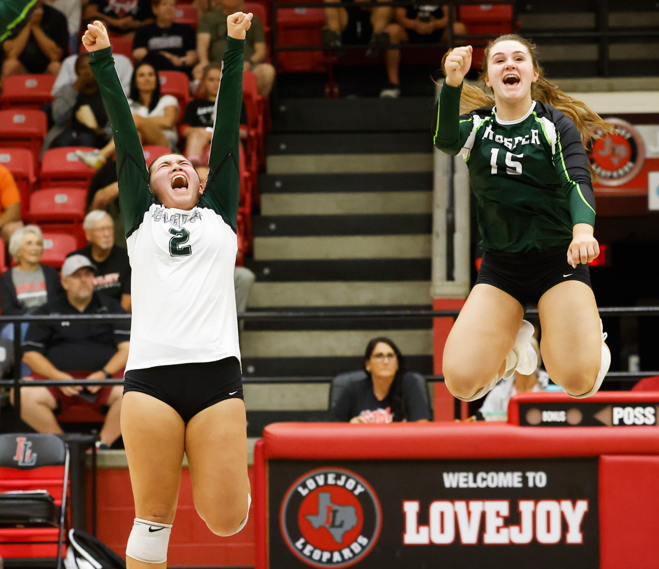 Prosper’s Brooklyn Bowman, left, and Resse Renfrow reacts as they celebrate a point against...