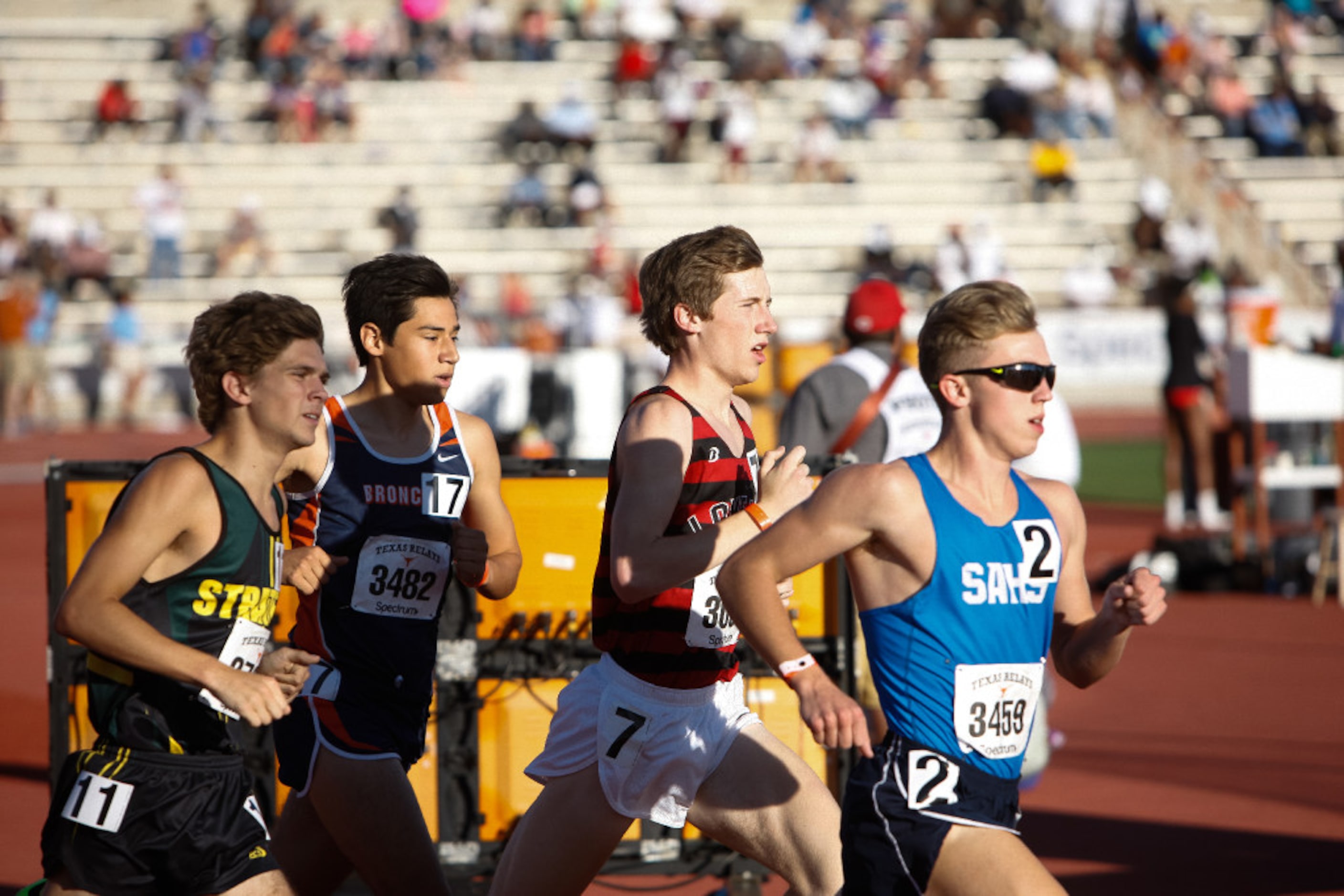 Lucas Lovejoy's Ryan Brands, second from right, competes in the boys 1600 meter run during...