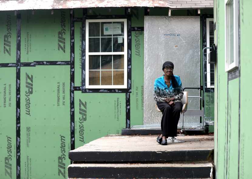 Annette Ray poses at the home where she currently rents a room in Dallas, Texas, Friday,...