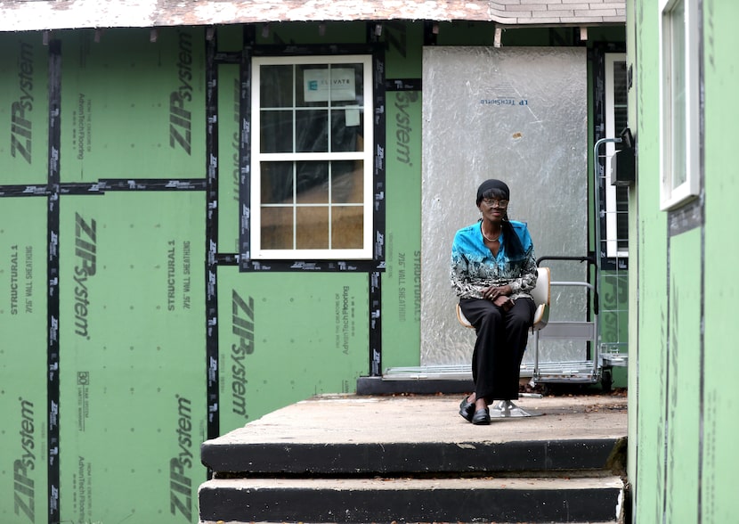 Annette Ray poses at the home where she currently rents a room in Dallas, Texas, Friday,...