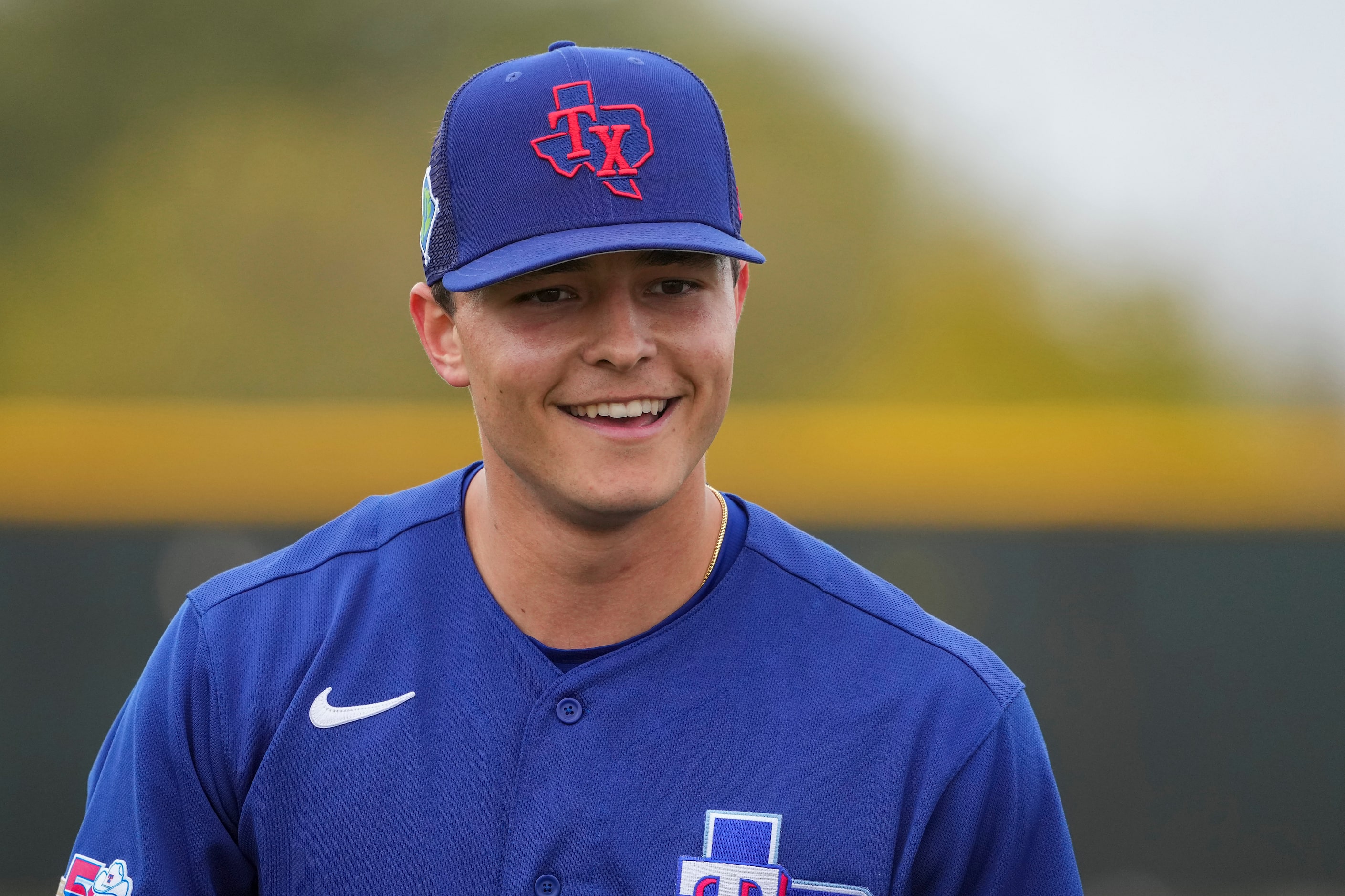 Texas Rangers pitcher Jack Leiter warms up before throwing a bullpen session a during a...